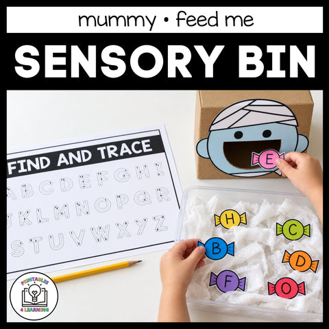 Child feeding the mummy in the Halloween Feed Me sensory bin, with the Find and Trace alphabet page