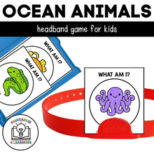 Load image into Gallery viewer, featured image of the printable ocean headband game showing the who am I game cards in a task box for storage and on the headband that would be worn during playing the game.
